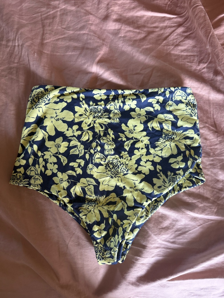 Acacia Swimwear Spring 2026 Navy Bikini Bottoms With Yellow Floral Print